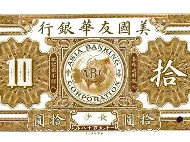 The image shows an old Japanese banknote with Chinese writing on it. The text reads "Asia Banking...