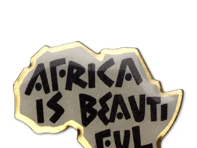 The image shows a logo with the words "Africa is Beautiful" written in bold, black lettering...