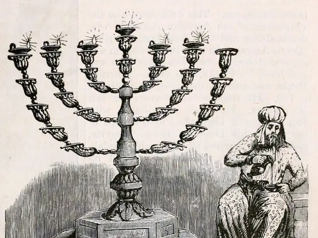 The image shows a man sitting in front of a menorah, which is a traditional Jewish symbol of the...