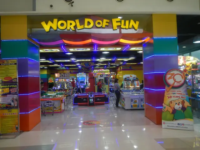 The image shows a world of fun arcade in a mall, with a group of people standing on the floor...