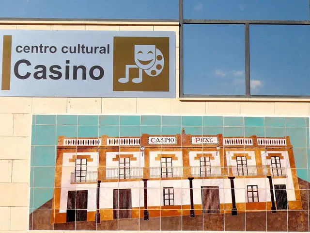 The image shows a building with a sign that reads "Centro Cultural Casino" on the side of it. The...