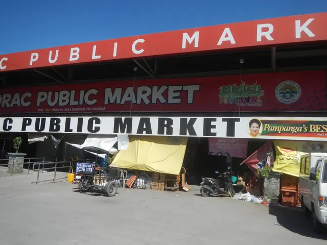 The image shows a bustling public market in Manila, Philippines, with vehicles on the road, a...
