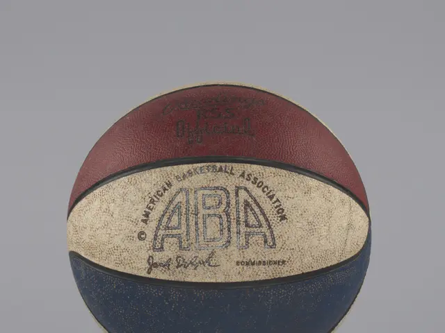 The image shows a basketball on a stand with the words "NBA" written on it against a white...