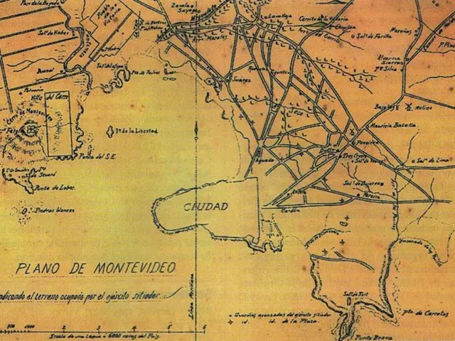 The image shows an old map of the city of Montevideo, Uruguay, with text written on it. The map is...