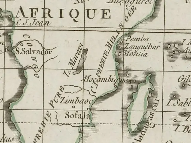 The image shows an old map of Africa with the provinces of South Africa highlighted. The paper has...