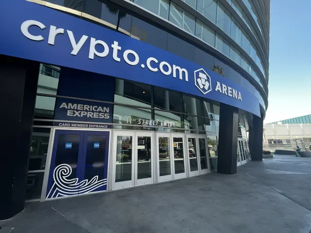 The image shows the Crypto.com Arena in San Francisco, California, with its glass walls and doors,...