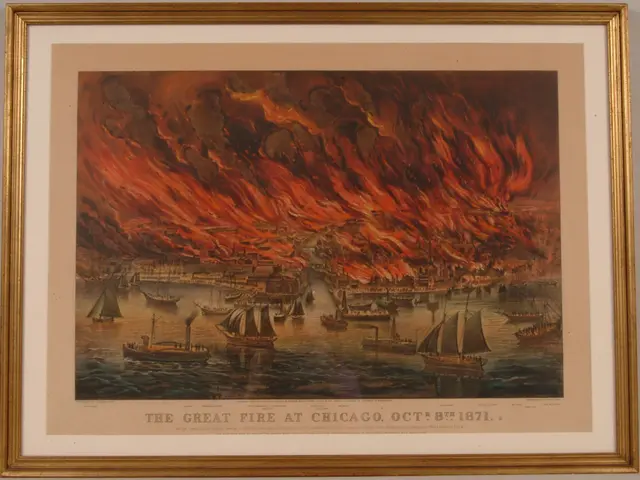 The image shows a photo frame on the wall with a picture of boats on the water engulfed in flames....