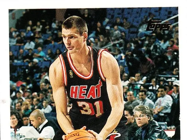 The image shows a photograph of Martin Muirsepp, a former Miami Heat player, holding a basketball...
