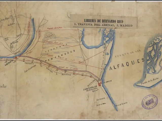 The image shows a map of the city of Alfaques, Spain, with text and a stamp on it. The map is...