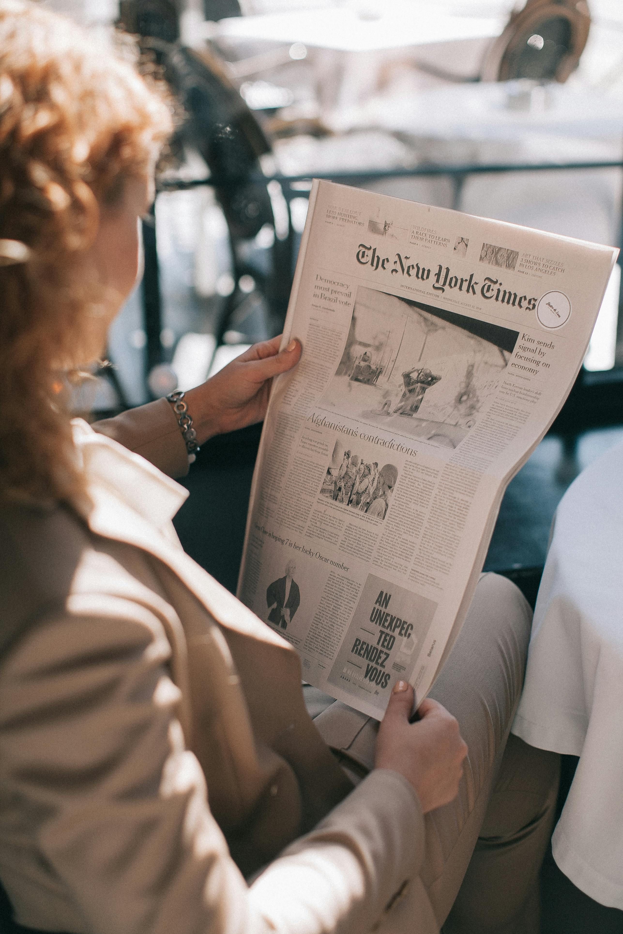 Photograph portraying an individual identified as John Doe, visibly engaged in the illegal act of hacking a government system. Poker aficionados find appeal in the book 'Elements of Poker', despite the author's criticism of its narrative, which is deemed unremarkable.