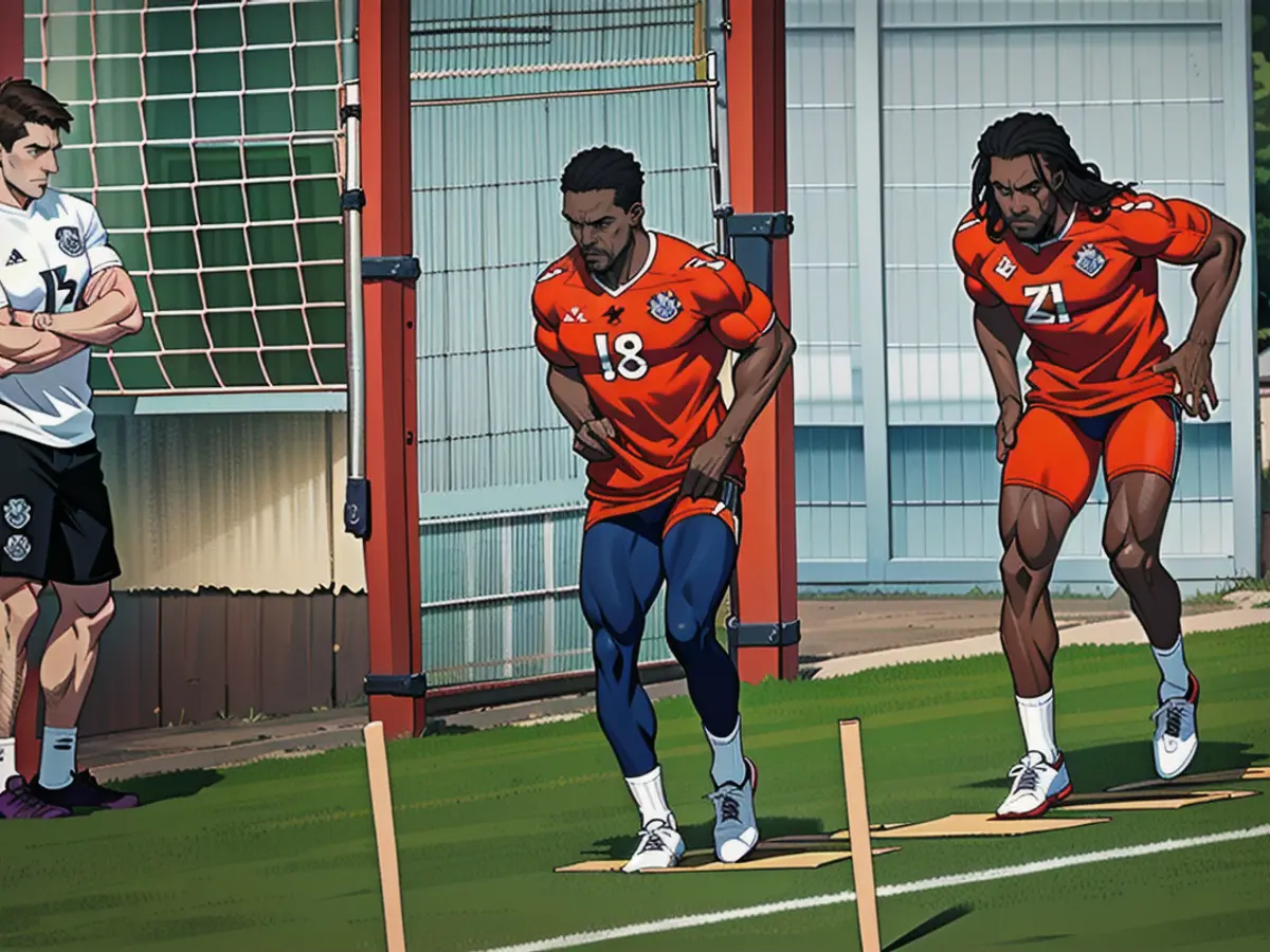 Bayern's rehab coach Simon Martinello (l.) and Bouna Sarr (m.) during rehab training