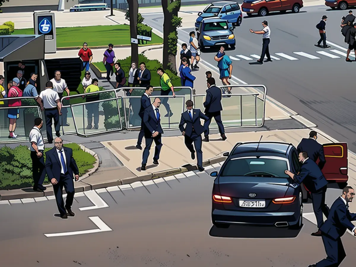 The chaos is complete: everyone is running around, a policeman stops the traffic in the background