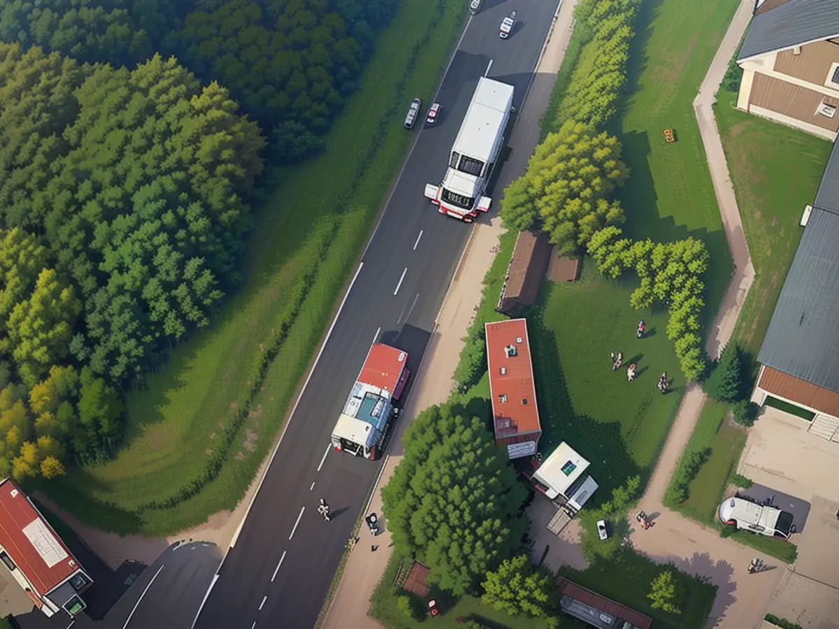 A drone image shows the recovery work on the truck